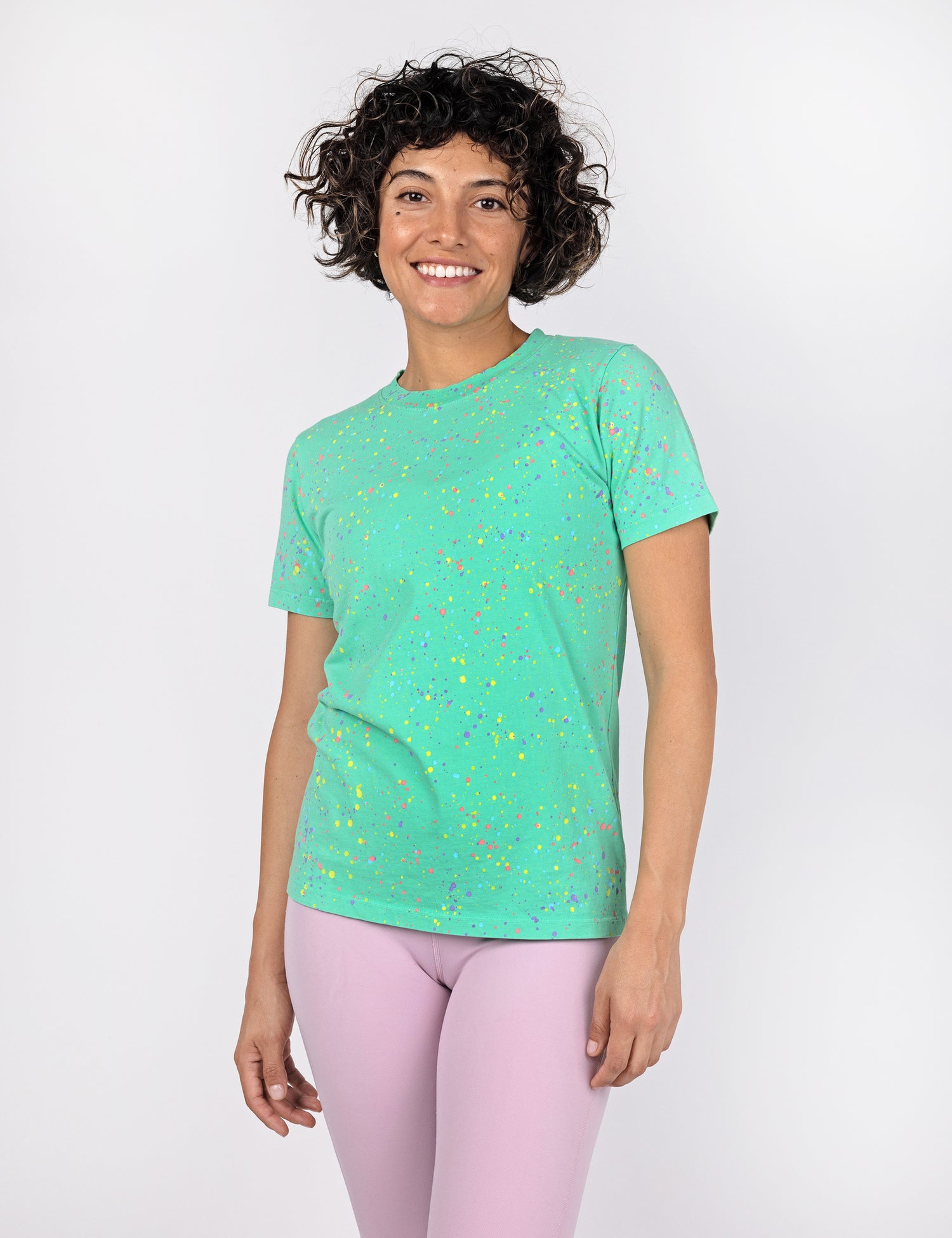 woman wearing a confetti painted t shirt