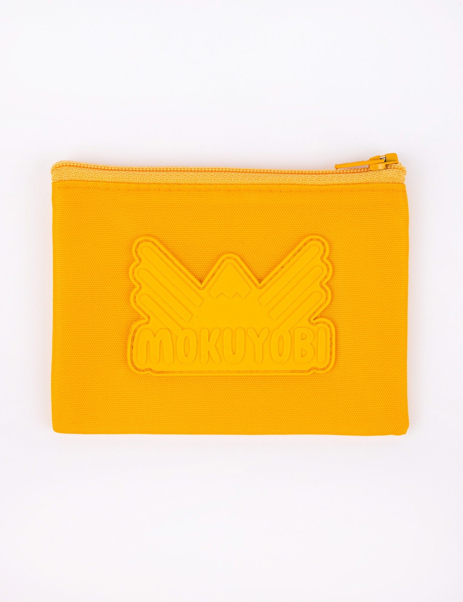 Small coin pouch with Mokuyobi logo in Saffron yellow