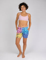 woman wearing colorful  relax fit style shorts with dog print all over.