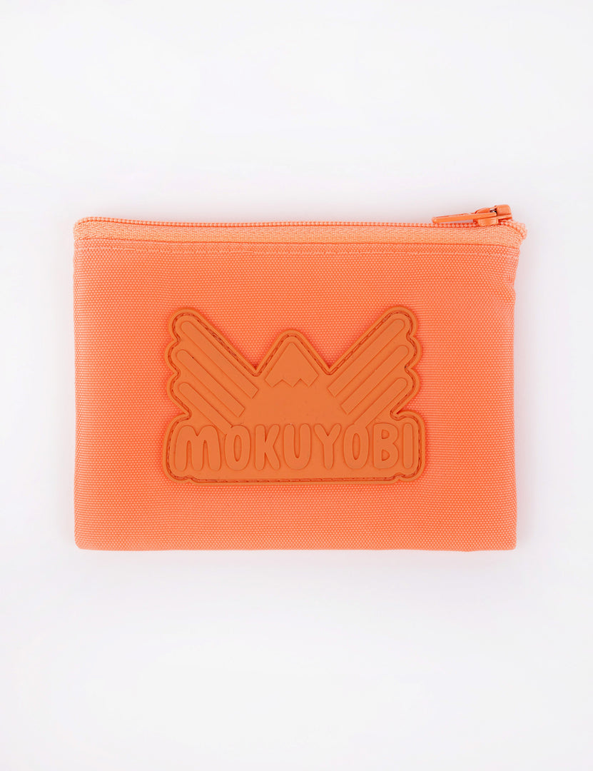 Small coin pouch with Mokuyobi logo in Coral
