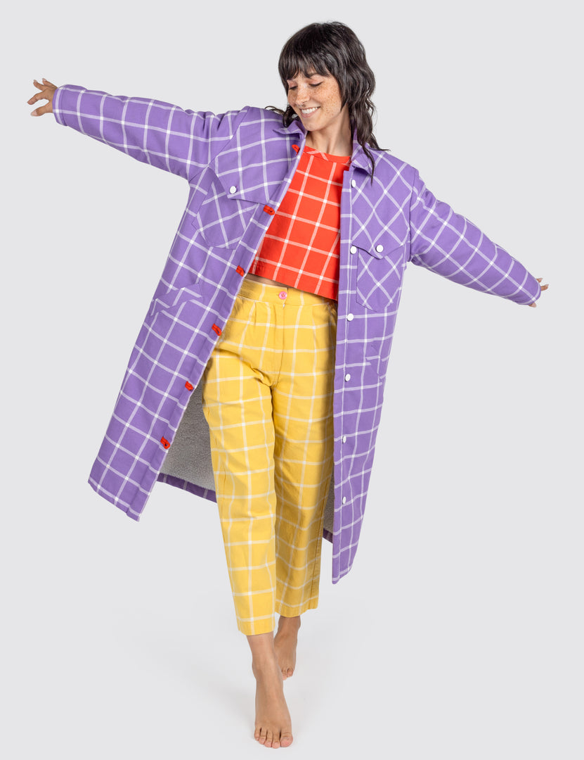 Woman wearing grid duster jacket and outfit 