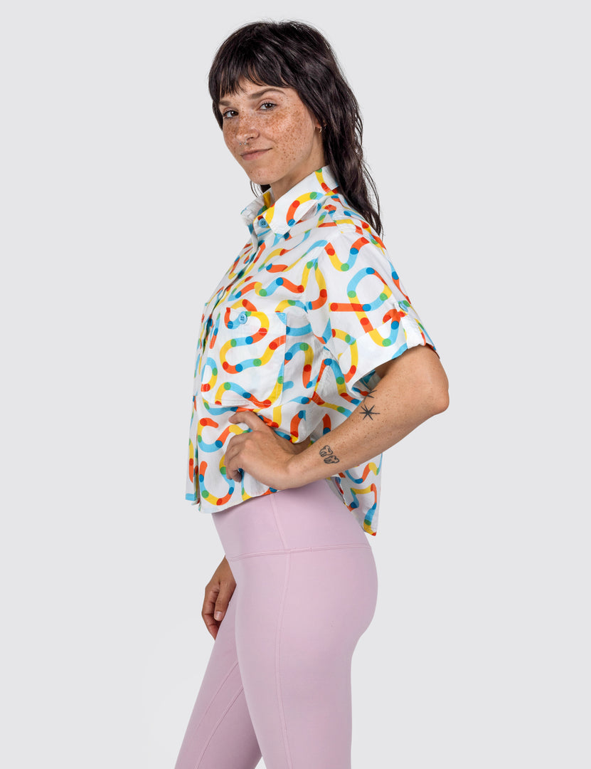 Woman wearing button up blouse 