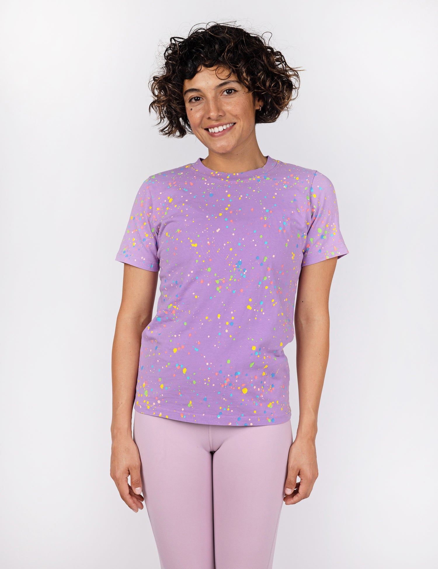 woman in purple t shirt with confetti design