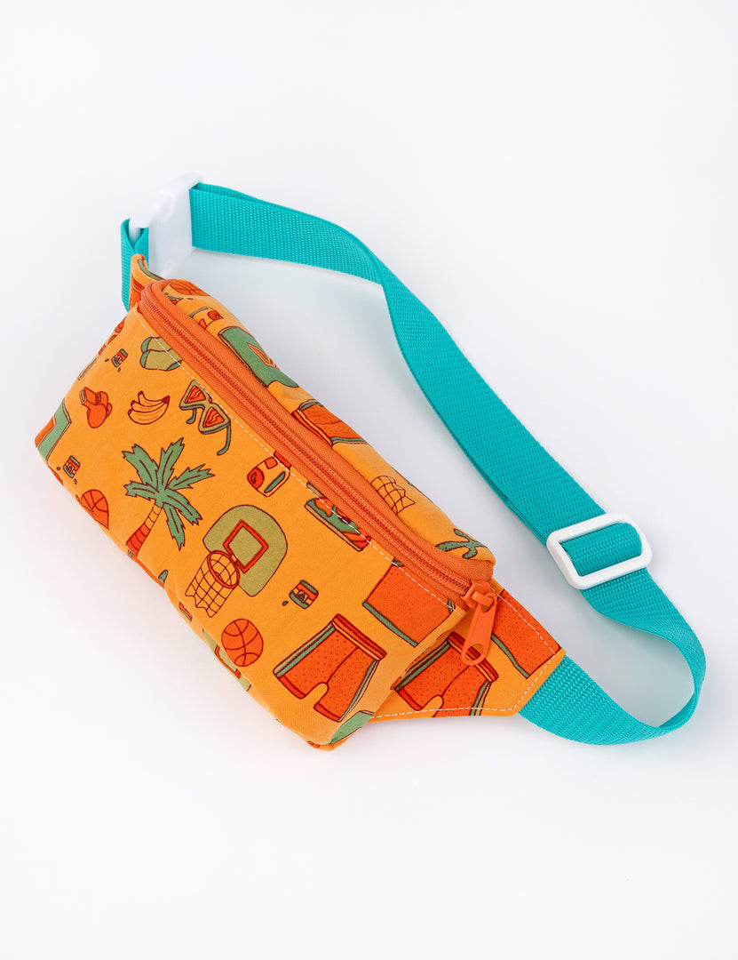 small orange fanny pack with basketball summer designs and blue strap