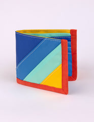 a bi-fold wallet in multiple colors