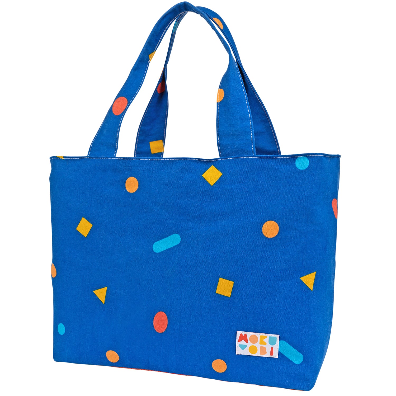 Large blue tote bag with small colorful designs